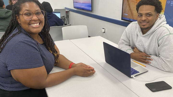Students working on a Zine
