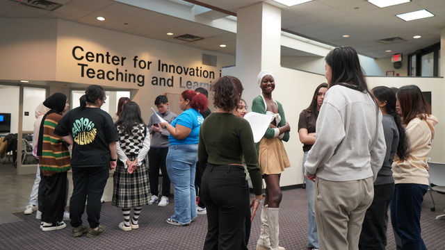 Students split into groups to hear their challenge for the event