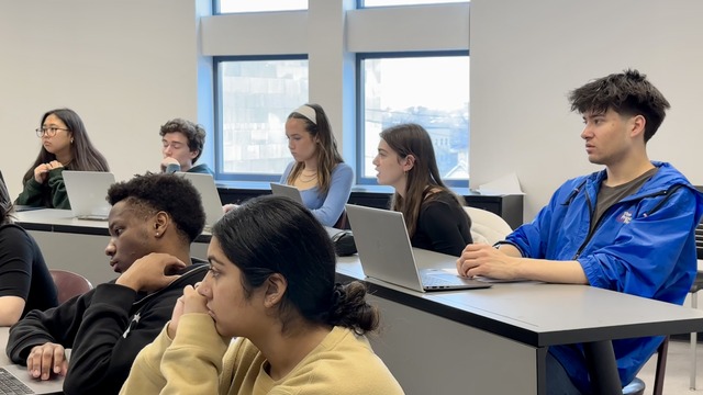 Students listening to the guest speaker
