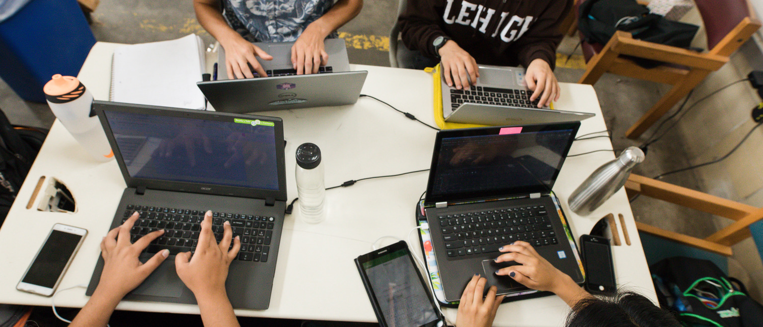 Students working on laptop computers